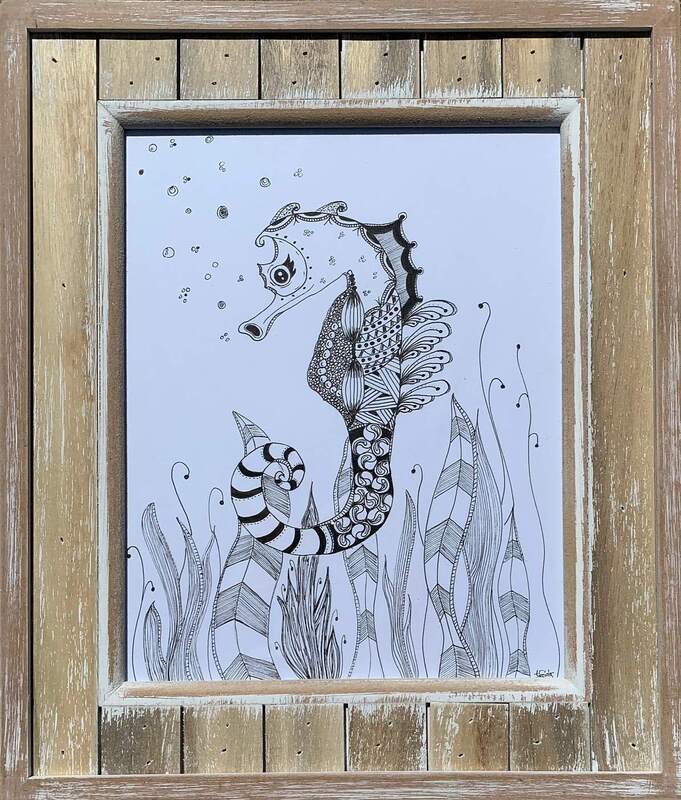 Framed seahorse drawing.