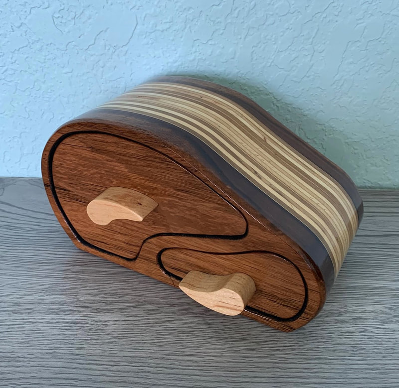 Handcrafted wooden jewelry box.