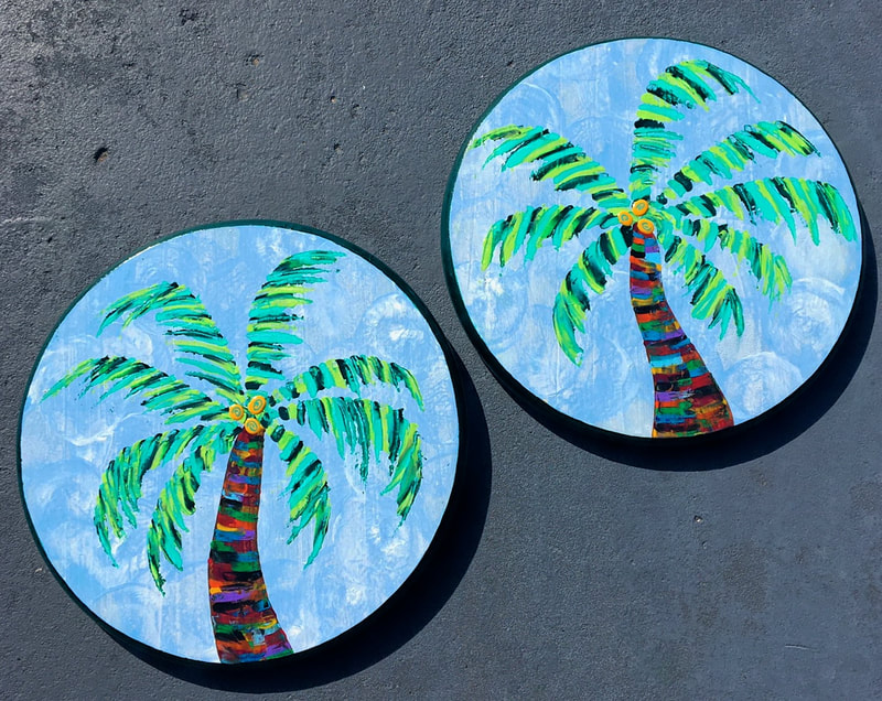 Round palm tree paintings.