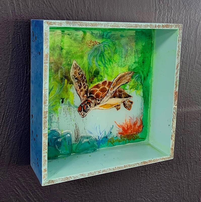 Turtle painting in a box frame.