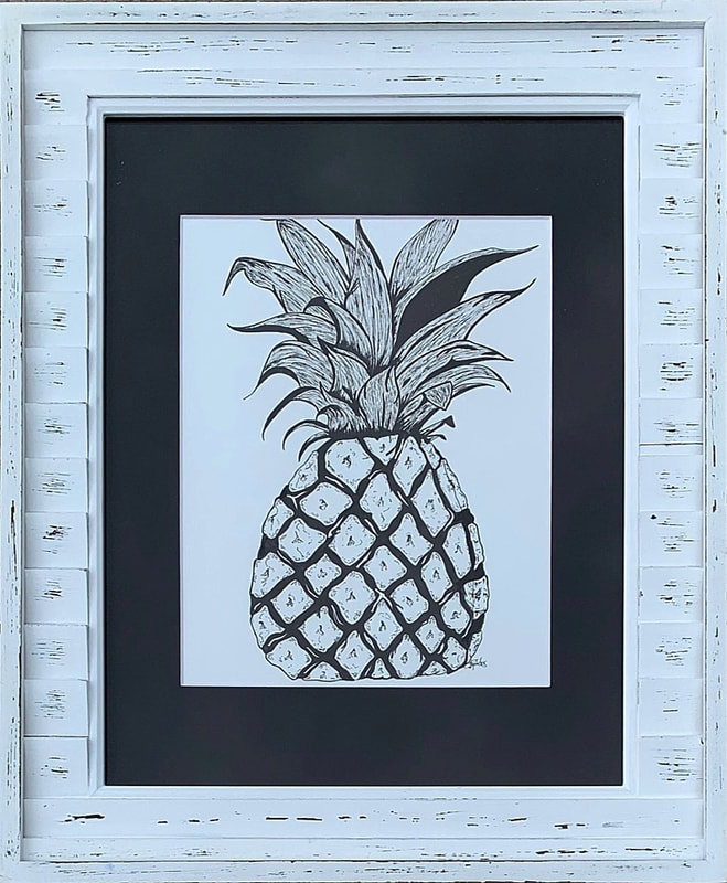 Pineapple drawing in white frame.